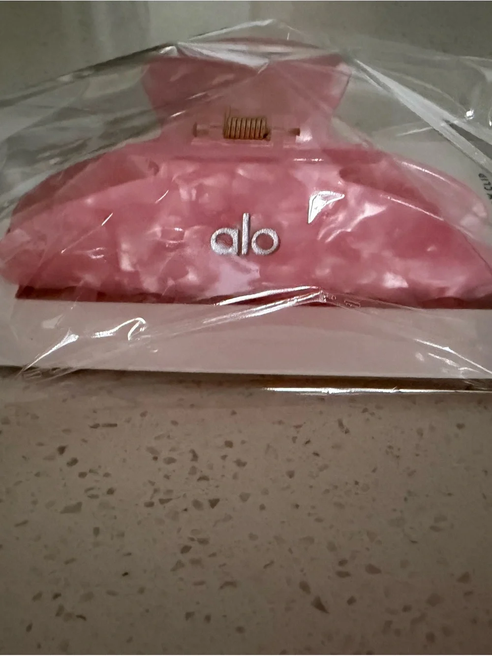 ALO Yoga Pink Acrylic Hair Claw with Gold Spring